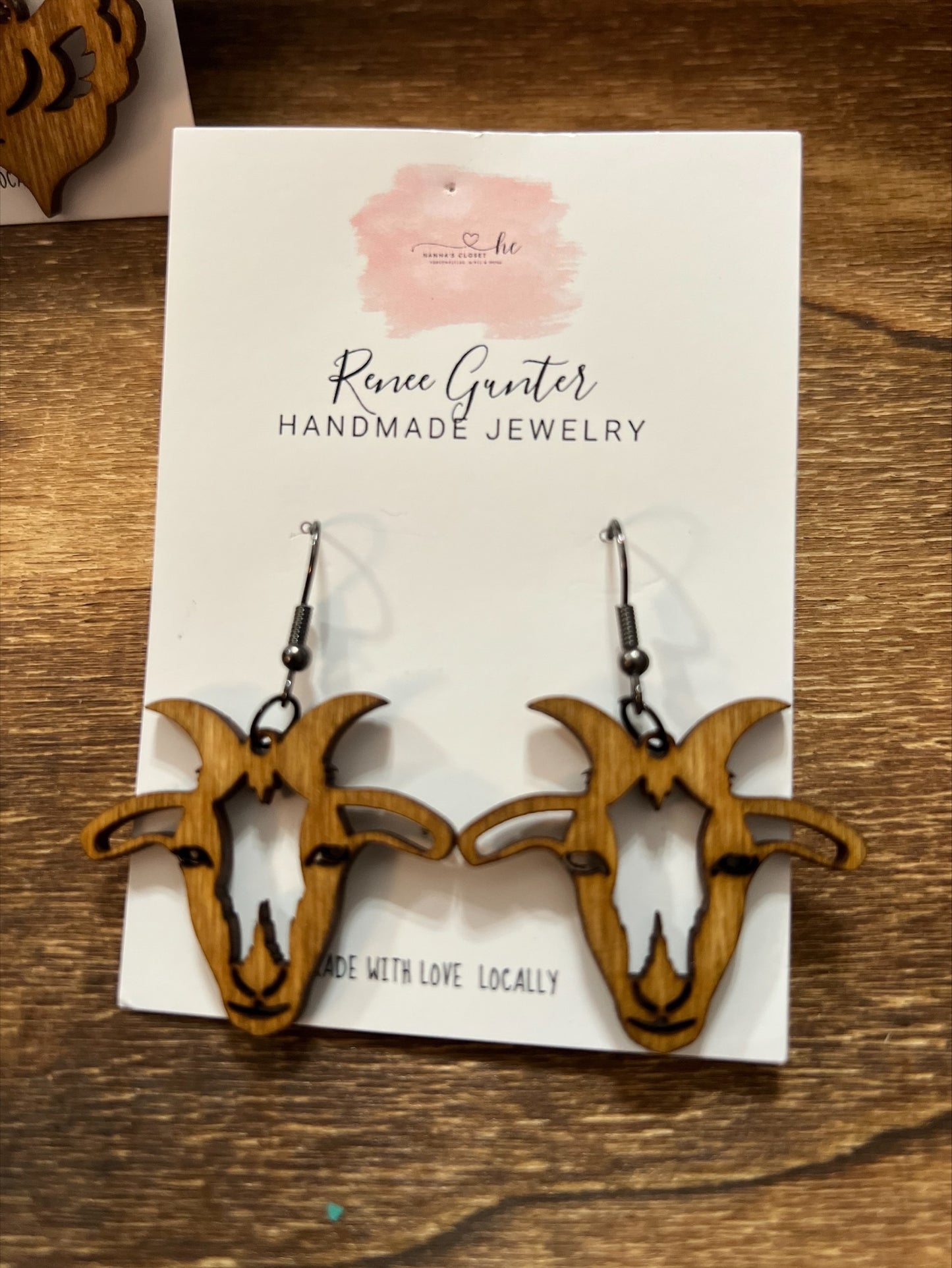 Handmade wood goat earrings.